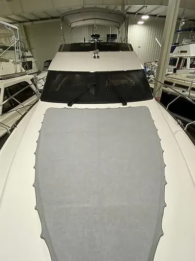 Inconseavable Yacht Photos Pics 2014 Marquis 500 Sport Bridge yacht indoors.