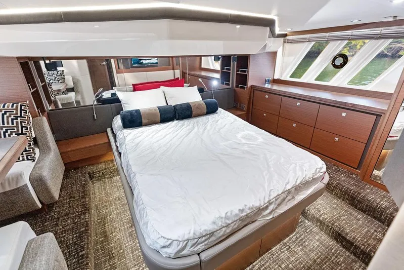  Yacht Photos Pics Luxurious bedroom interior of 2015 Sea Ray 510 Fly yacht with modern design.