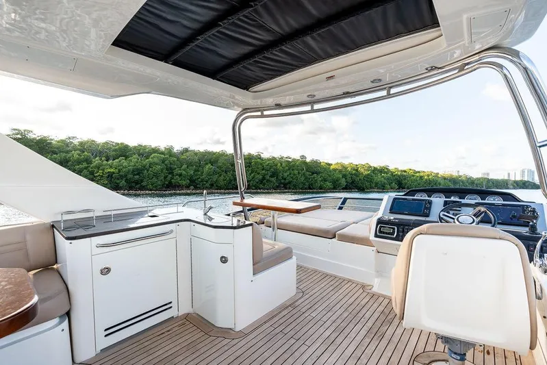  Yacht Photos Pics Luxurious 2015 Sea Ray 510 Fly yacht interior with sleek design and scenic water view.