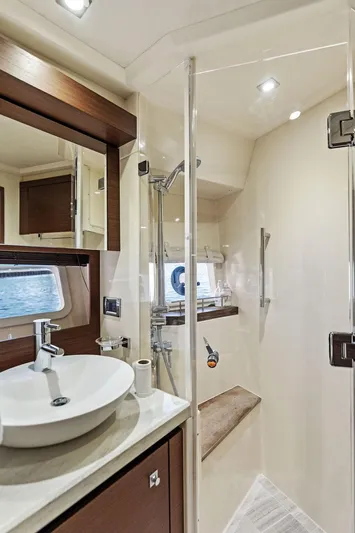  Yacht Photos Pics Luxurious bathroom in 2015 Sea Ray 510 Fly yacht with modern fixtures and elegant design.