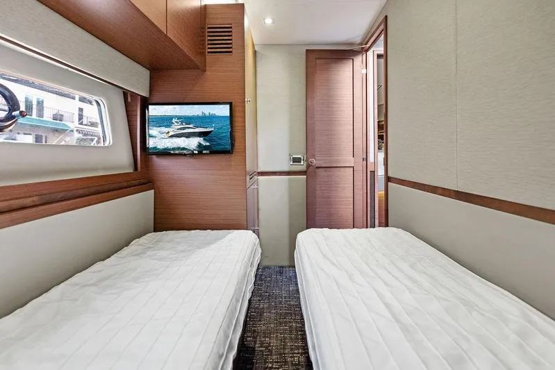  Yacht Photos Pics Interior cabin of 2015 Sea Ray 510 Fly yacht with twin beds and TV.