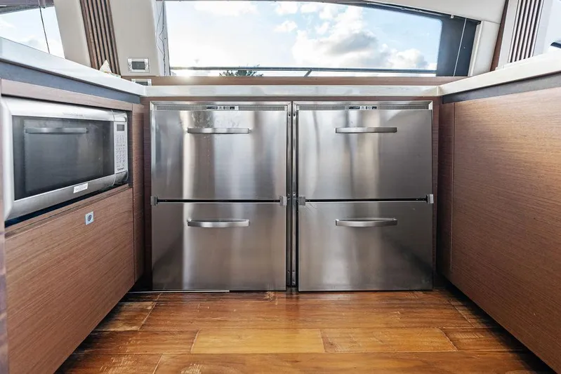  Yacht Photos Pics Modern kitchen area in 2015 Sea Ray 510 Fly yacht with stainless steel appliances.