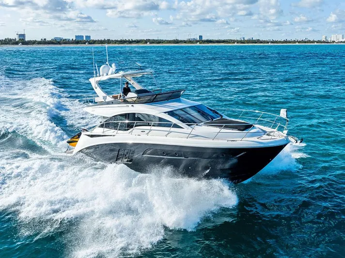  Yacht Photos Pics 2015 Sea Ray 510 Fly yacht cruising on open ocean waters.