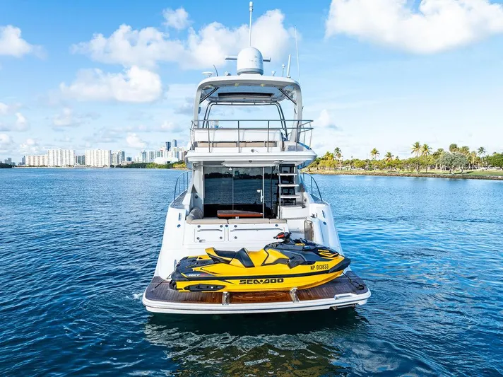  Yacht Photos Pics 2015 Sea Ray 510 Fly yacht with Sea-Doo jet ski on water.