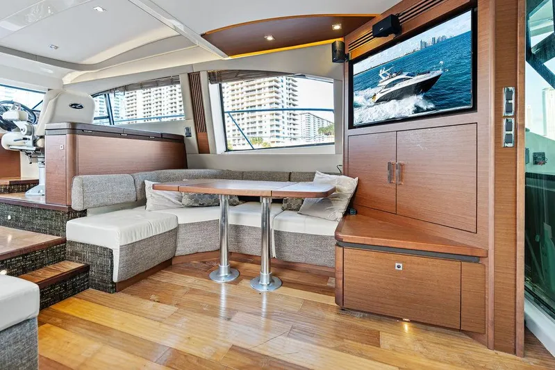  Yacht Photos Pics Luxurious interior of 2015 Sea Ray 510 Fly yacht with modern seating and entertainment system.