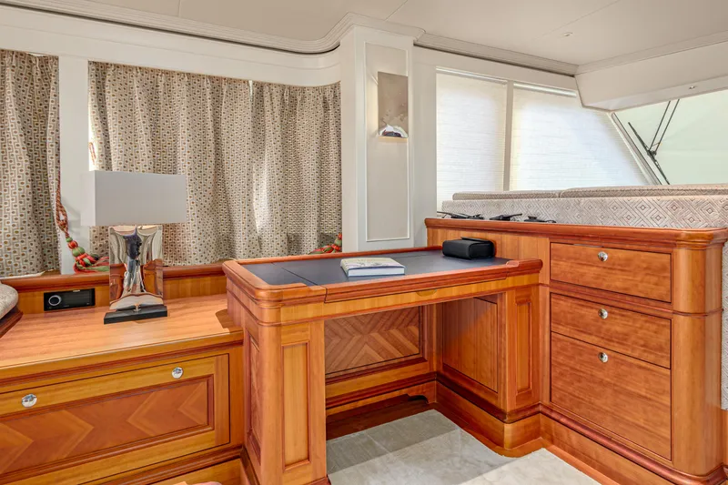 Frivolous Yacht Photos Pics Luxurious 2019 Hunt Yachts motor yacht interior with elegant wood furnishings and natural light.
