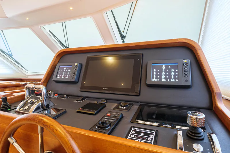 Frivolous Yacht Photos Pics Control panel of 2019 Hunt Yachts Motor Yacht with advanced navigation systems.