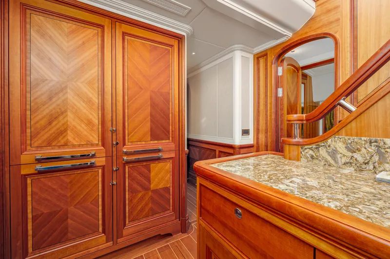Frivolous Yacht Photos Pics Luxurious 2019 Hunt Yachts motor yacht interior with elegant wood cabinetry and marble countertop.
