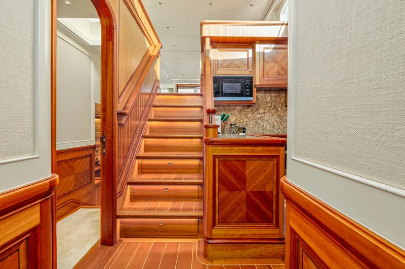 Frivolous Yacht Photos Pics Luxurious 2019 Hunt Yachts motor yacht interior with elegant wood finishes and modern kitchen.