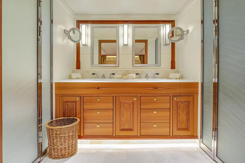 Frivolous Yacht Photos Pics Luxurious 2019 Hunt Yachts motor yacht bathroom with wooden vanity and modern lighting.