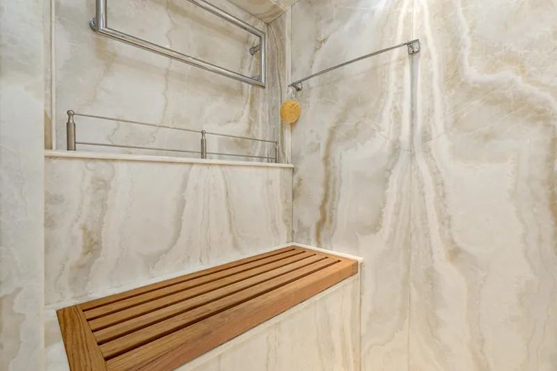 Frivolous Yacht Photos Pics Luxurious marble shower with wooden bench in 2019 Hunt Yachts motor yacht.