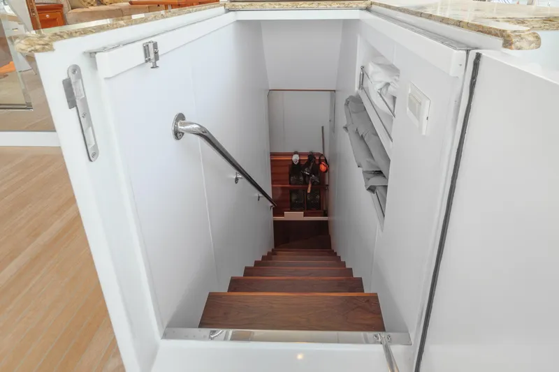 Frivolous Yacht Photos Pics Staircase leading below deck on 2019 Hunt Yachts motor yacht.