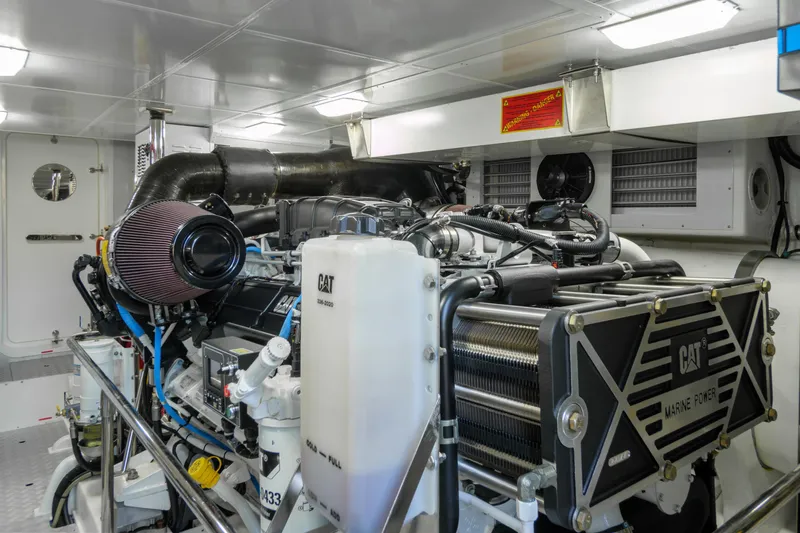 Frivolous Yacht Photos Pics Engine room of 2019 Hunt Yachts Motor Yacht with CAT marine power system.