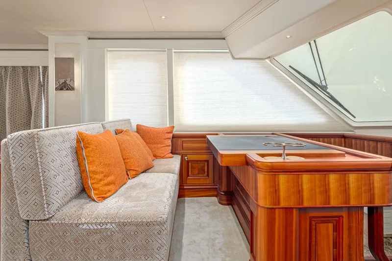 Frivolous Yacht Photos Pics Luxurious 2019 Hunt Yachts motor yacht interior with elegant seating and wooden accents.