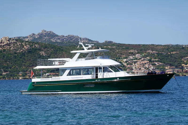 Frivolous Yacht Photos Pics 2019 Hunt Yachts Motor Yacht on scenic coastal waters.