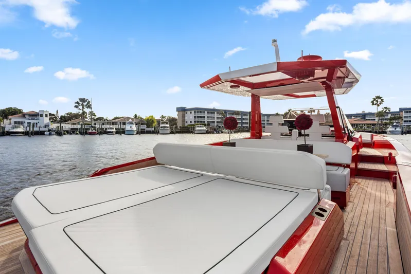 Corso Red Yacht Photos Pics Luxurious 2021 Wally 48ft yacht with sleek design, docked in a scenic marina.