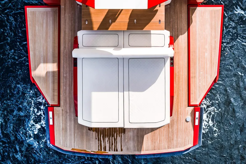 Corso Red Yacht Photos Pics Top view of 2021 Wally 48ft yacht with sleek deck design on ocean.