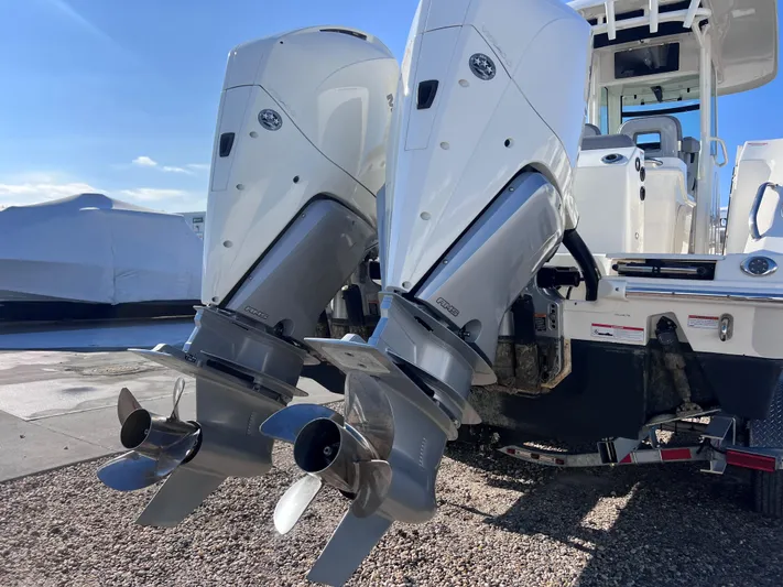  Yacht Photos Pics 2022 Boston Whaler 280 Outrage with dual outboard engines, rear view.