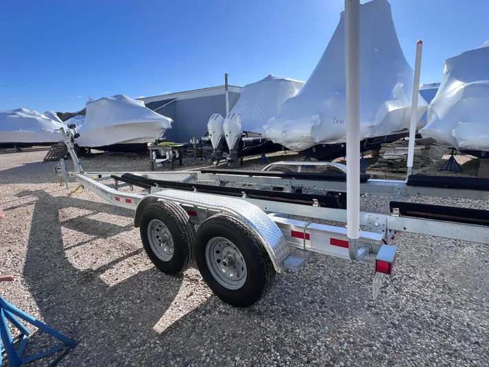  Yacht Photos Pics Trailer for 2022 Boston Whaler 280 Outrage, parked in a boat storage yard.