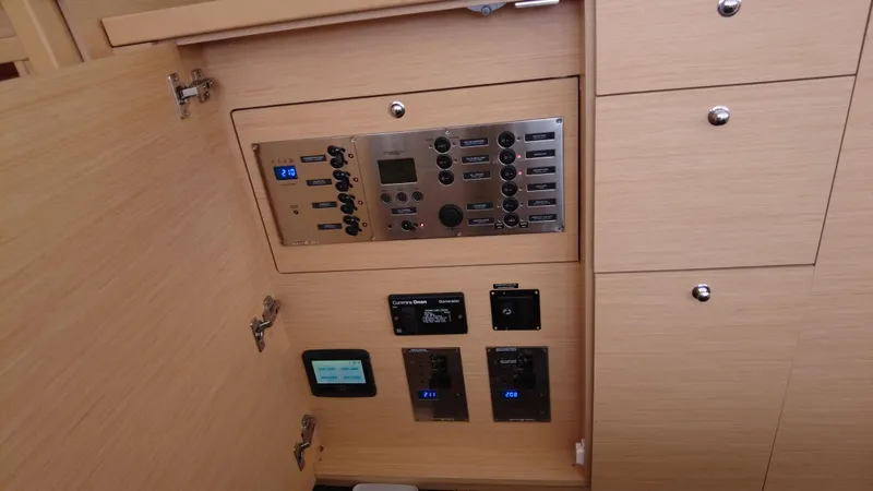  Yacht Photos Pics Control panel inside 2019 Lagoon 450S yacht, featuring various switches and displays.
