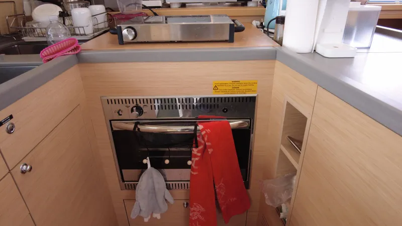  Yacht Photos Pics Modern kitchen in 2019 Lagoon 450S yacht with oven and countertop appliances.