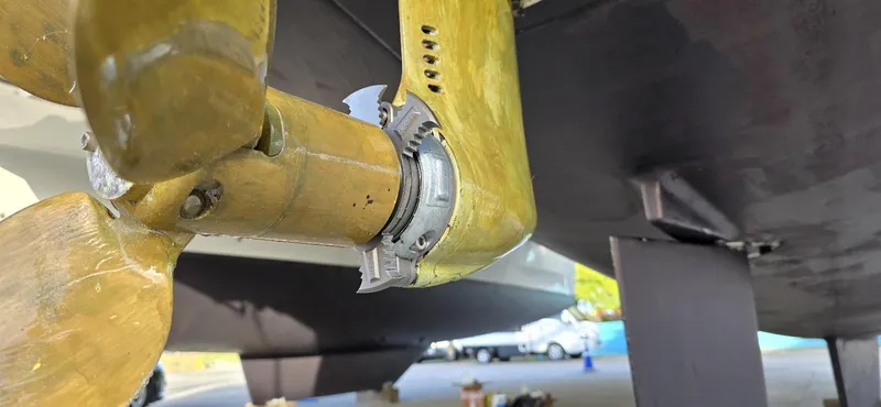  Yacht Photos Pics Close-up of a 2019 Lagoon 450S sailboat propeller and shaft in a boatyard.