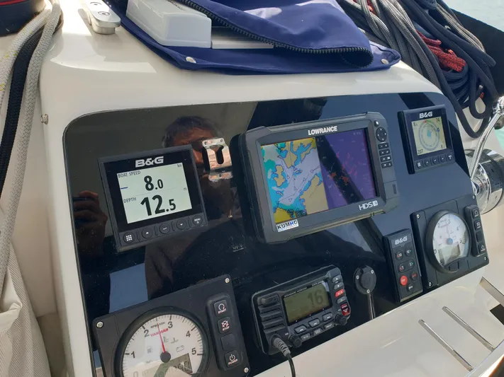  Yacht Photos Pics Control panel of a 2019 Lagoon 450S catamaran with navigation and communication instruments.