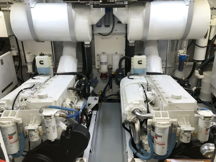 Dovetail Yacht Photos Pics Engine room of a 1972 Trumpy 72 Houseboat with dual engines.