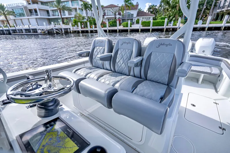  Yacht Photos Pics 2021 Yellowfin 39 boat interior with luxury seating and modern navigation system.