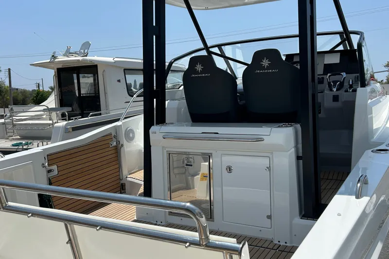  Yacht Photos Pics 2025 Jeanneau CAP CAMARAT 9.0WA SERIE 2 boat interior with sleek seating and modern design.