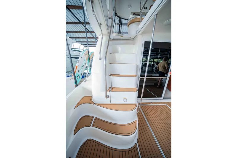  Yacht Photos Pics Staircase on 1999 Sea Ray 480 Sedan Bridge yacht with teak flooring.