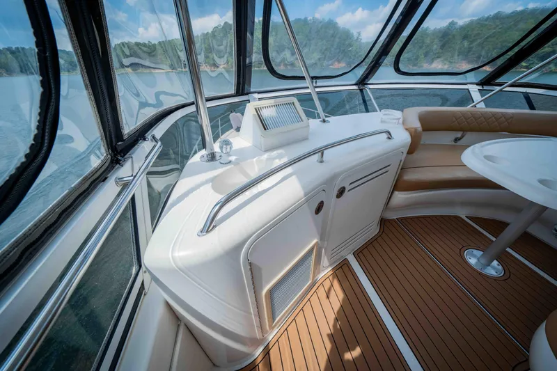  Yacht Photos Pics 1999 Sea Ray 480 Sedan Bridge interior with sleek design and panoramic windows.