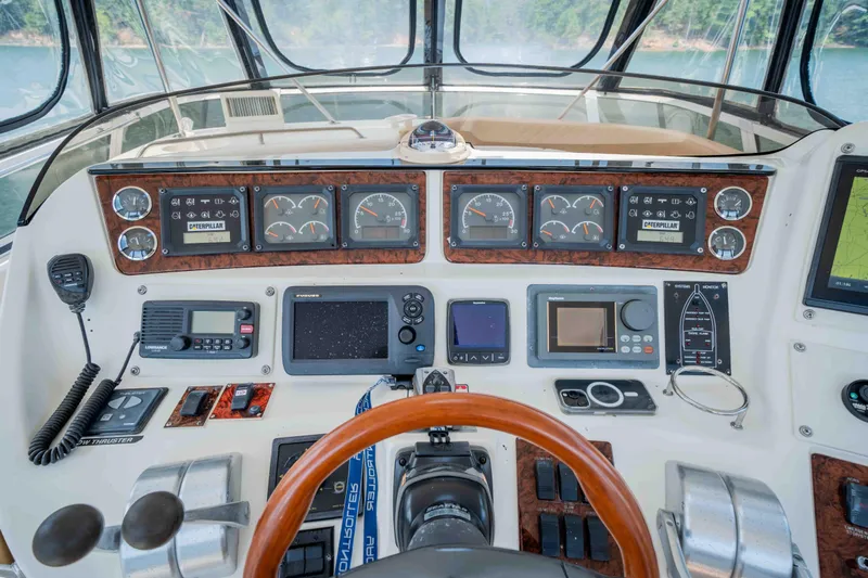  Yacht Photos Pics Control panel of a 1999 Sea Ray 480 Sedan Bridge yacht with navigation instruments.