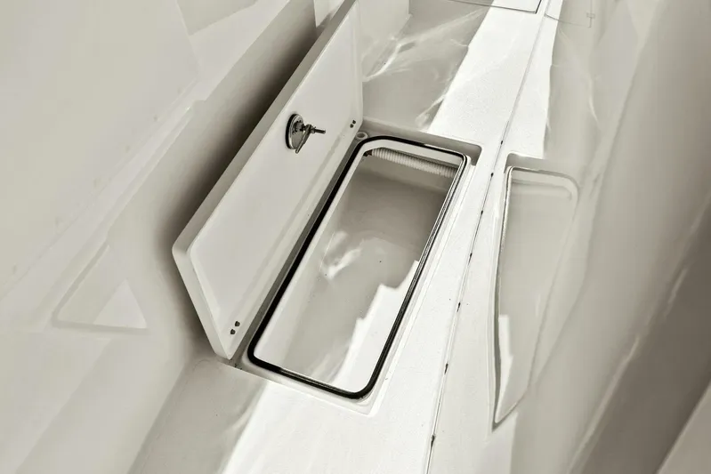  Yacht Photos Pics 2023 Cobia 301 Center Console storage compartment detail.