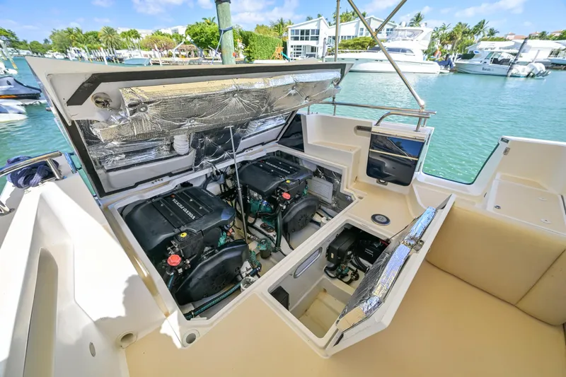 Euphony Yacht Photos Pics 2013 MJM 36z Downeast boat engine compartment open, docked in a marina.