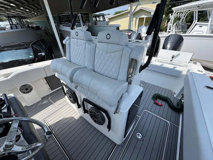  Yacht Photos Pics 2022 Fountain 38TE boat interior with white seating and modern design.