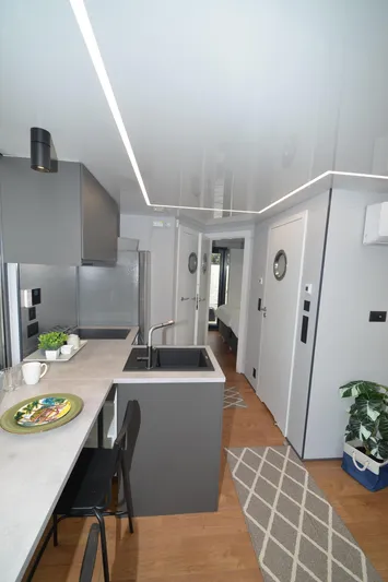  Yacht Photos Pics Modern kitchen interior in La Mare Modern 11, 2024 model, featuring sleek design and contemporary decor.