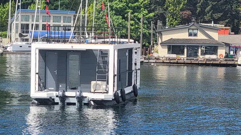  Yacht Photos Pics Floating houseboat "La Mare Modern 11" on a serene lake, 2024 model.