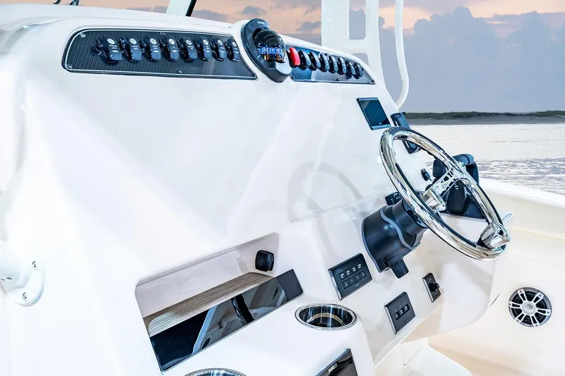  Yacht Photos Pics Manufacturer Provided Image: 2025 Grady-White Canyon 336 helm with modern controls and steering wheel.