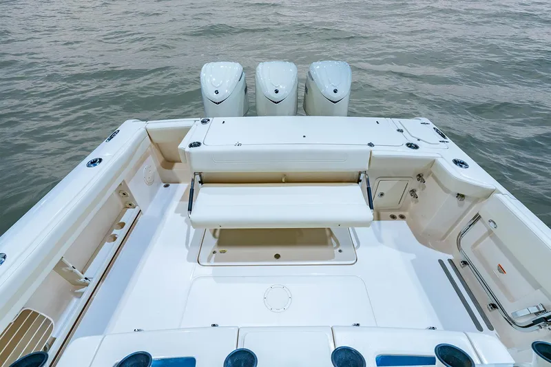  Yacht Photos Pics Manufacturer Provided Image: 2025 Grady-White Canyon 336 boat deck with triple outboard engines.