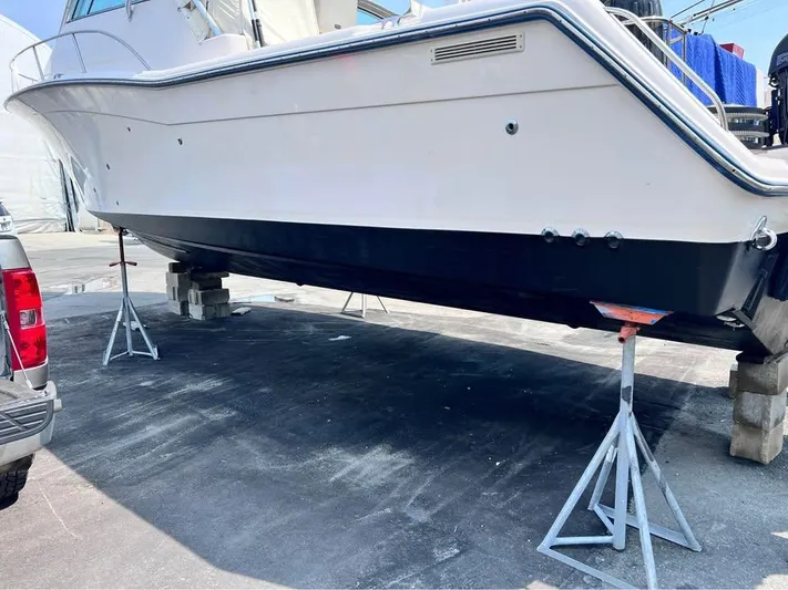  Yacht Photos Pics 2005 Grady-White Express 360 boat on stands for maintenance.