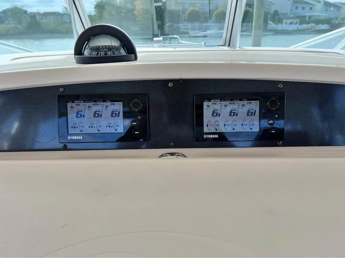  Yacht Photos Pics Dashboard of 2005 Grady-White Express 360 with Yamaha displays and compass.