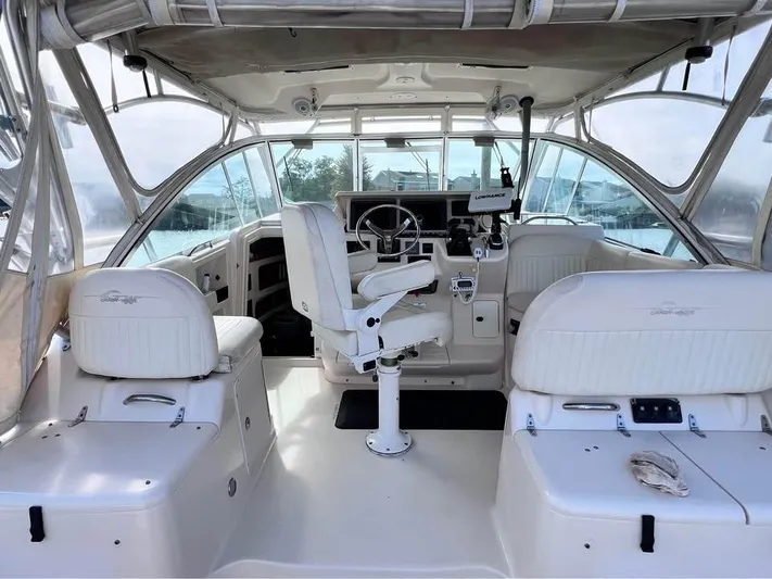  Yacht Photos Pics 2005 Grady-White Express 360 boat interior with helm, seating, and controls.