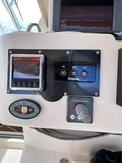  Yacht Photos Pics Control panel of a 2005 Grady-White Express 360 boat with Yamaha systems.
