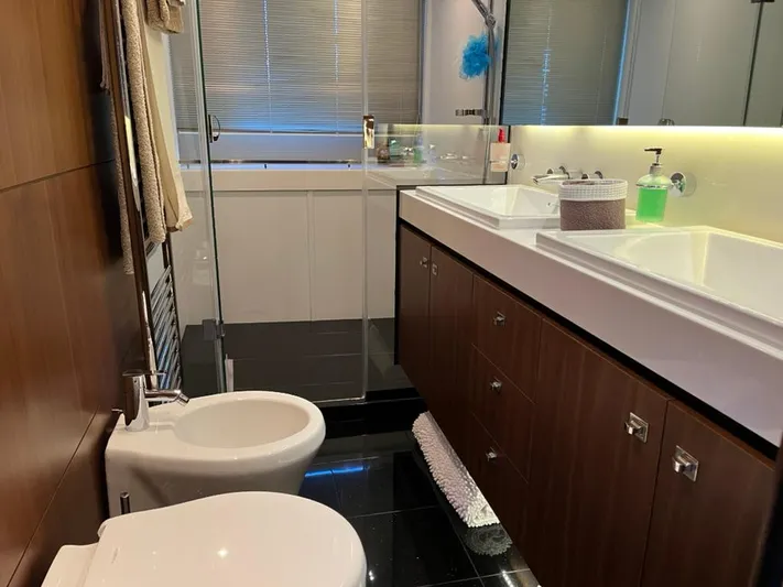  Yacht Photos Pics Luxurious bathroom in 2013 Princess 72 Motor Yacht with modern fixtures and elegant design.