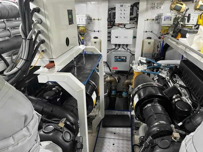  Yacht Photos Pics Engine room of a 2013 Princess 72 Motor Yacht, showcasing machinery and equipment.