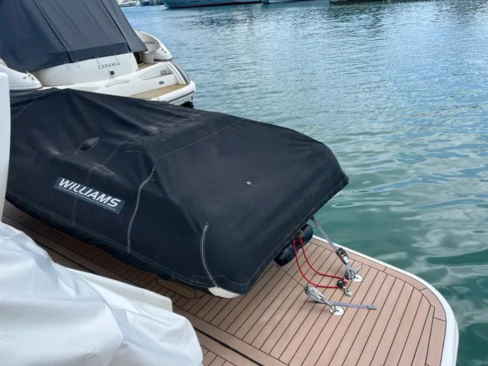  Yacht Photos Pics Covered Williams tender on Princess 72 Motor Yacht, 2013 model, docked at marina.