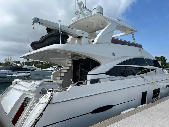  Yacht Photos Pics 2013 Princess 72 Motor Yacht docked, showcasing sleek design and luxurious features.