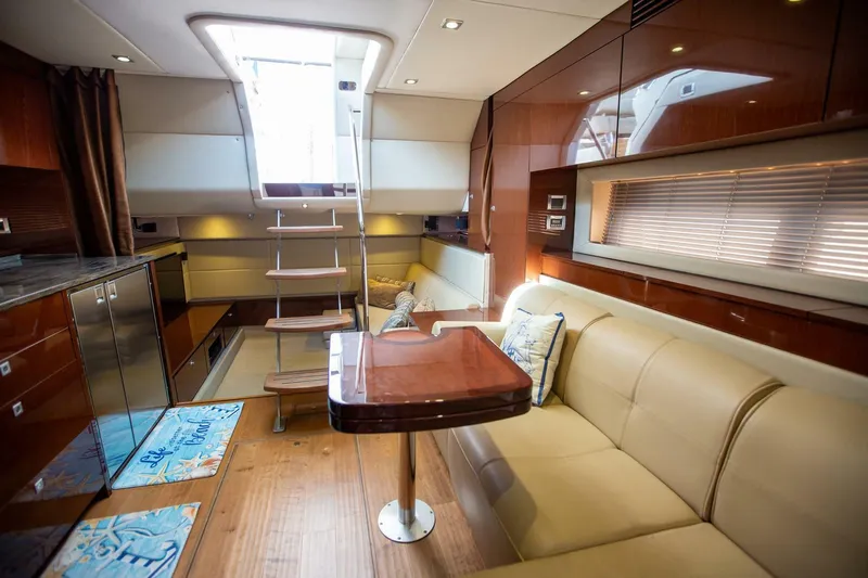  Yacht Photos Pics Luxurious interior of 2015 Sea Ray 450 Sundancer yacht with modern furnishings.