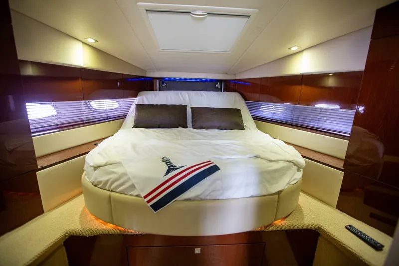  Yacht Photos Pics Luxurious cabin interior of 2015 Sea Ray 450 Sundancer yacht with cozy bed.
